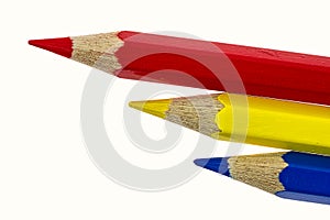 Red, yellow and blue color pencils isolated on white background