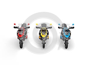 Red, yellow and blue modern bikes with windshields