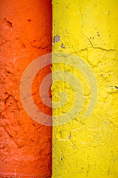 Red and yellow color combination old Textured damage wall