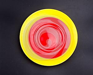 Red and yellow empty plate