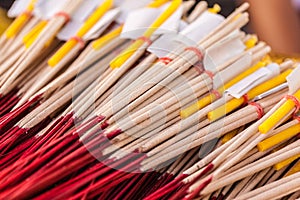 Red and yellow incense sticks