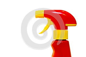 Red and yellow intense colours plastic water spray bottle used for cleaning products at home in the kitchen or bathroom