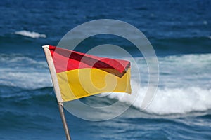 RED AND YELLOW LIFEGUARD FLAG