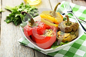 Red and yellow peppers stuffed with the meat, rice and vegetables