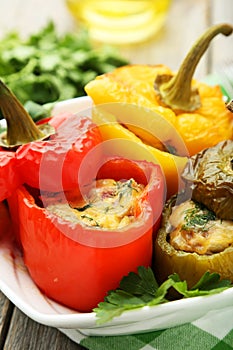 Red and yellow peppers stuffed with the meat, rice and vegetables