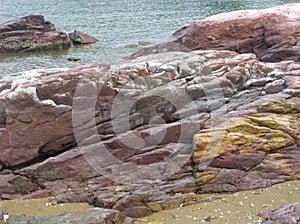 Red and Yellow Sandstones on Beach