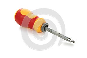 Red and yellow screwdriver isolated on background