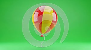 red and yellow striped balloon on green background