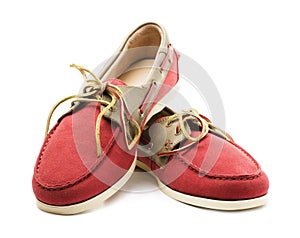 Red and yellow suede men`s top sider shoes or boat shoes