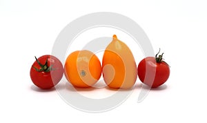 Red and yellow tomatoes on a light background. Natural product.