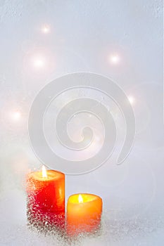 Red yellow white background frost snow candle two window lights