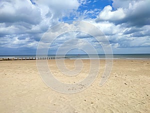 Redcar beach on a cloudy but sunny day photo