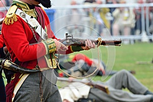 Redcoat firing Musket in re-enactment