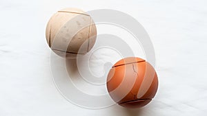 Is a reddish brown with visible cracks on its surface suggesting