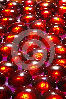 Reddish glass beads