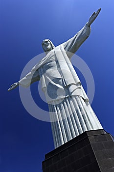 REDEEMER CHRIST, RIO DE JANEIRO, BRAZIL - APRIL 06, 2011: Bottom view of the Christ RedeemerÃÂ´s Statue. The deep blue sky behind.