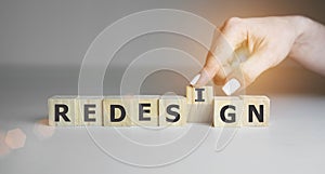 REDESIGN word made with building blocks, restart concept