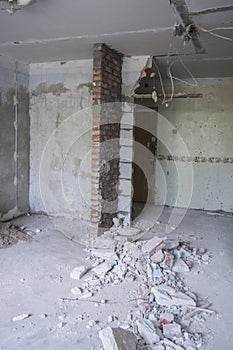 Redevelopment of old rooms. Home repairs. Industrial vertical background. Nobody room with a window and a door.