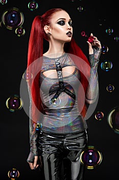 Redhair model blowing air bubbles