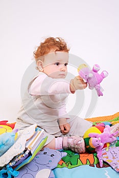 Redhead baby playing