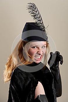 Redhead in black hat pretending to snarl