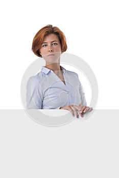 Redhead business woman holding blank sign
