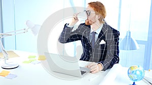 Redhead Businessman Drinking Coffee at Work, Relaxing Freelancer Designer