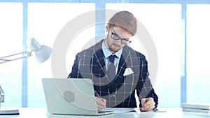 Redhead Businessman Writing in Office, Documentation