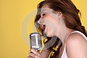Redhead female singer.