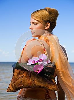 Redhead girl on the beach