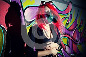 Redhead girl in gasmask