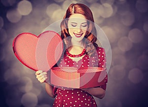 Redhead girl with gift for Valentines Day