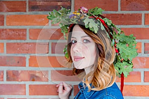 Redhead girl with oak leaves wreath at Germany Unity day