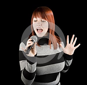 Redhead girl singing karaoke