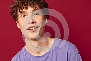 Redhead guy with curly hair posing gesture with hands