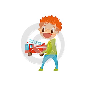 Redhead little boy playing wirh fire truck, cute cartoon character vector Illustration on a white background