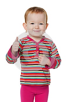 Redhead little girl holding her thumb up