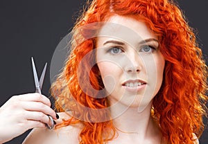 Redhead with scissors