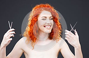 Redhead with scissors