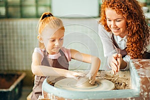 Redhead sisters make a pitcher of a pottery wheel