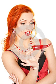 Redhead woman with chili pepper