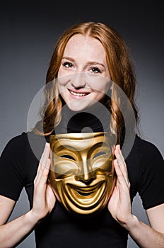 Redhead woman iwith mask