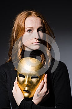 Redhead woman iwith mask photo