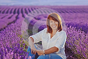 Redhead woman in lavender field