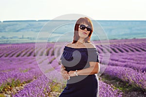 Redhead woman in lavender field