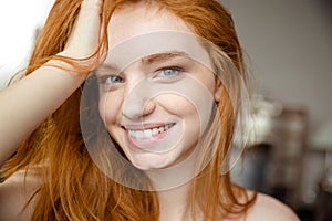 Redhead woman looking at camera