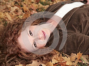 Redhead woman lying down