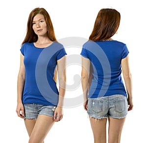 Redhead woman posing with blank blue shirt