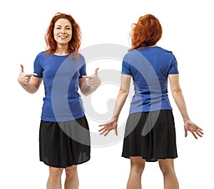 Redhead woman posing with blank blue shirt