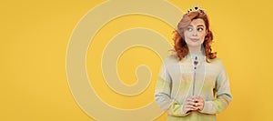 redhead woman in queen crown with magic wand, wish. Woman  face portrait, banner with copy space.